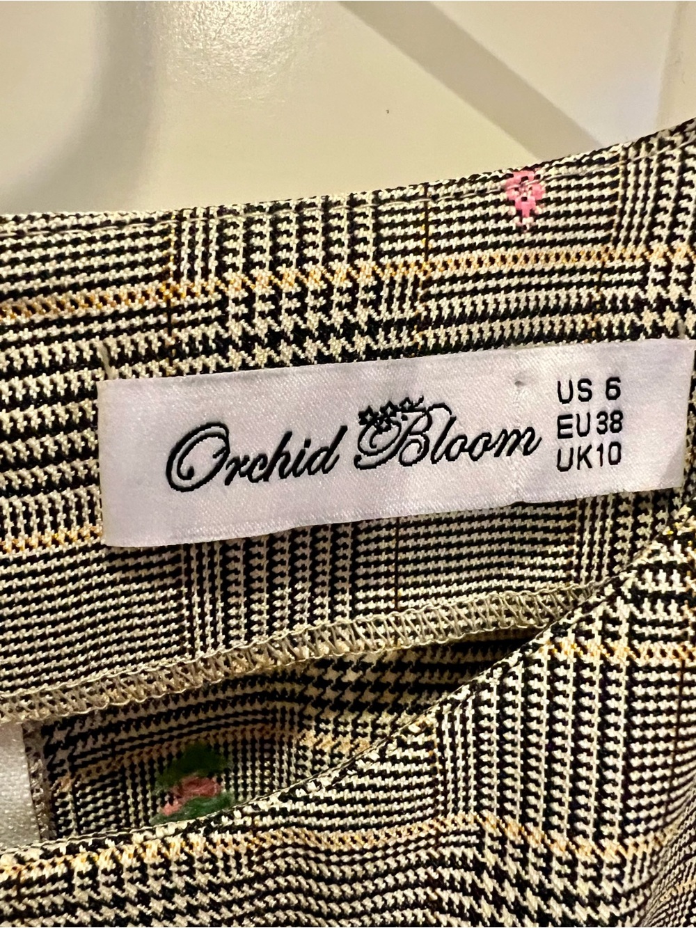 Orchid Bloom Plaid dress in Black, White & tan with pink roses